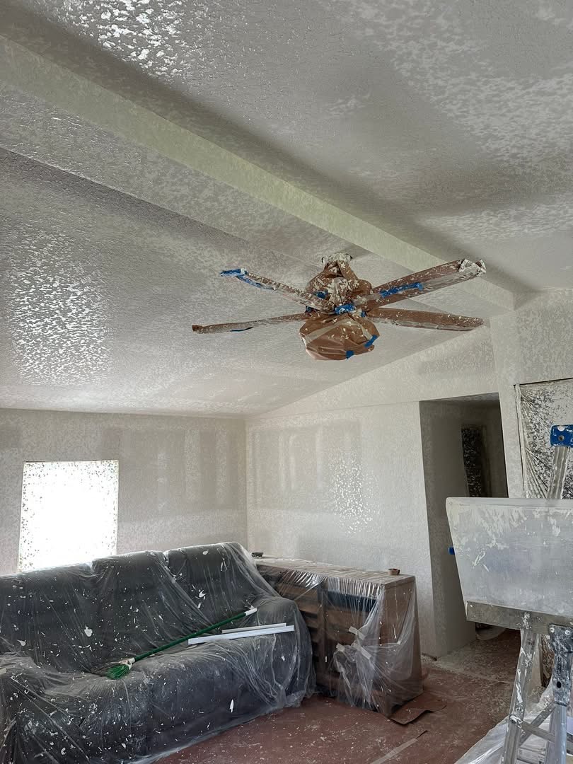 Ceiling after popcorn removal with fresh knockdown texture